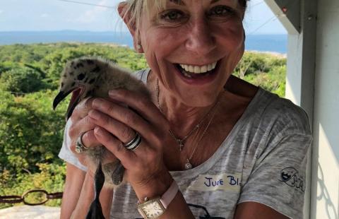 Jude Blake holding a small bird