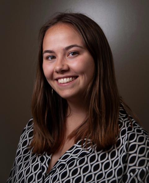 Headshot of Emily Brown, smiling