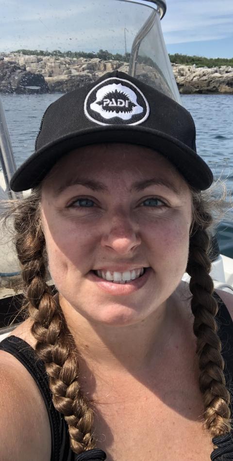 smiling woman with hat