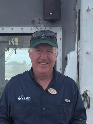 captain roger at the helm