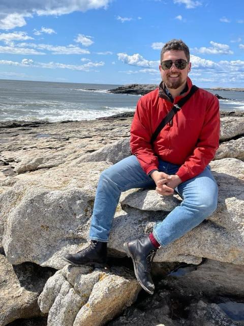 man on rocks at beach